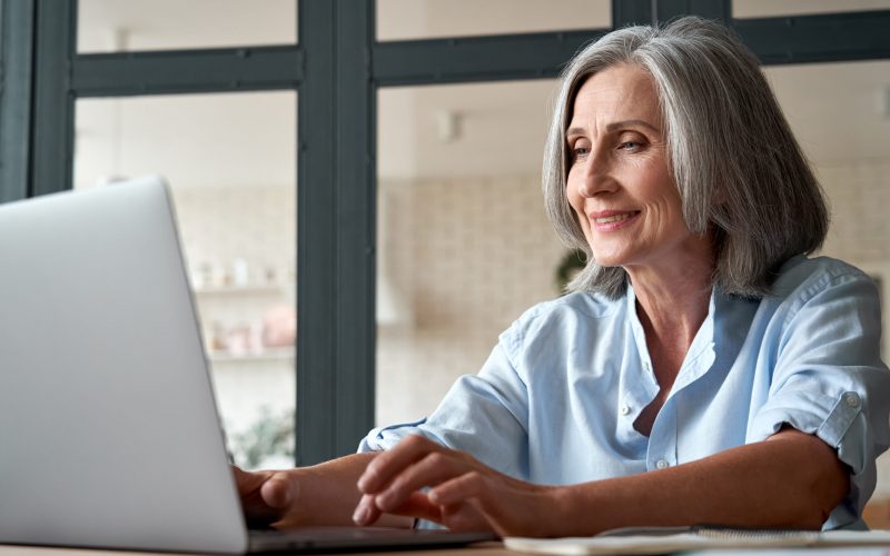 woman checking results on patient portal